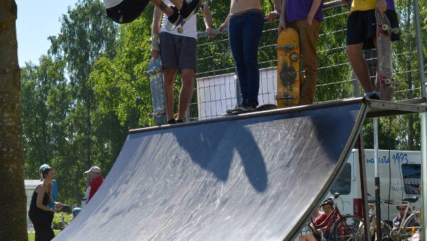 Skateboard ramp and skaters.